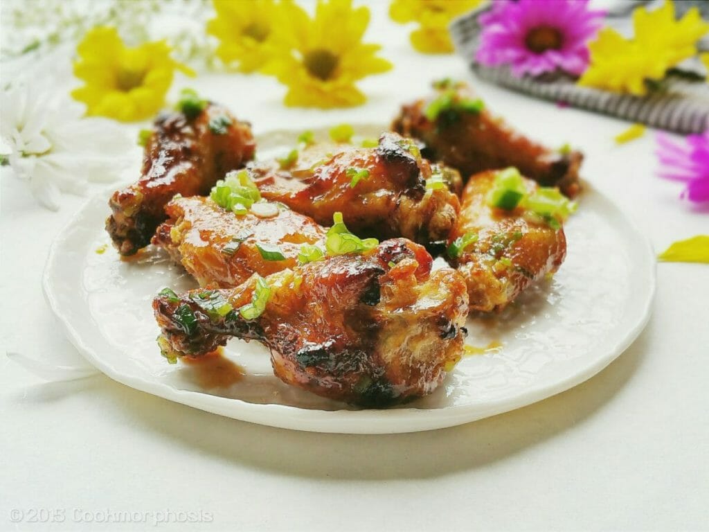 gluten free chicken wings topped with scallion oil