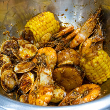 Garlic Cajun boiling mixed seafood with corn and potatoes