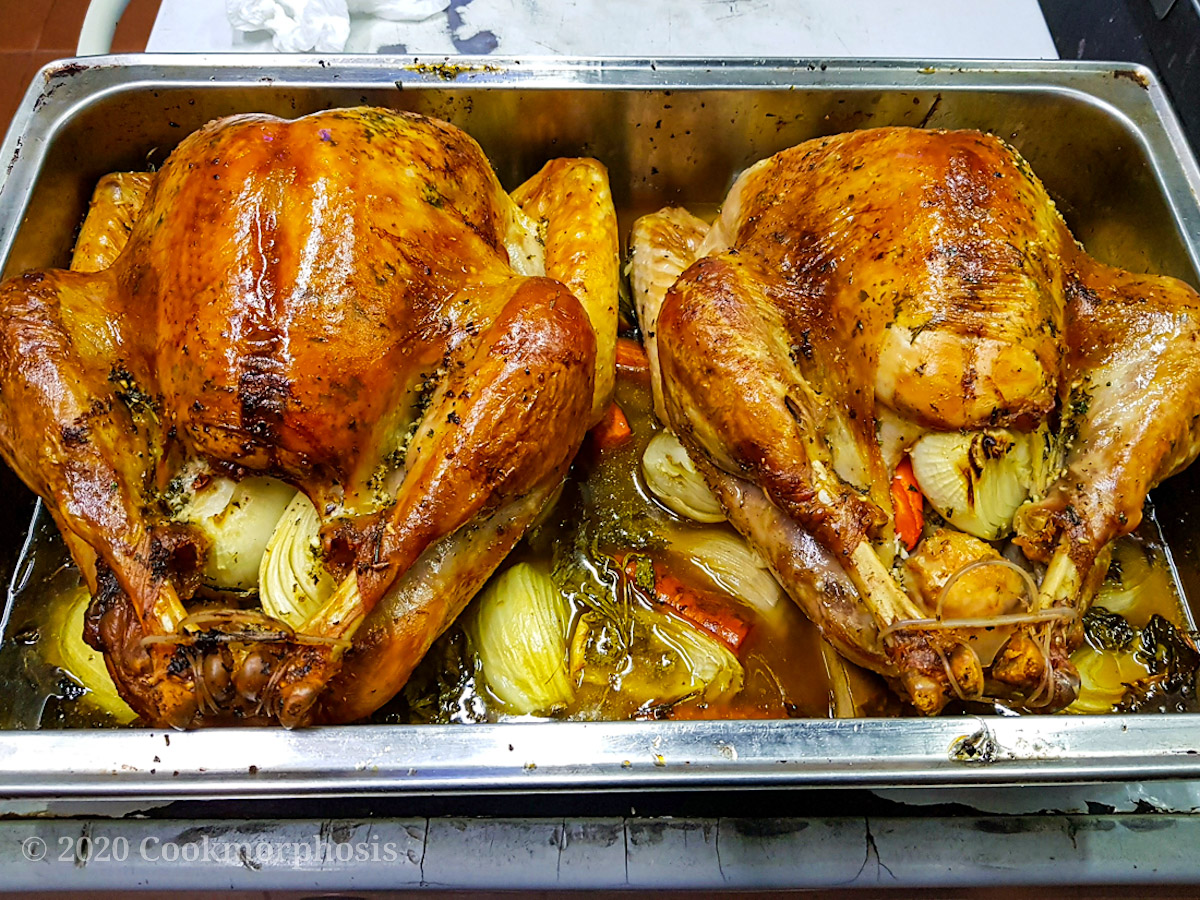 2 perfect roasted turkey for Thanksgiving are put in the hotel pan