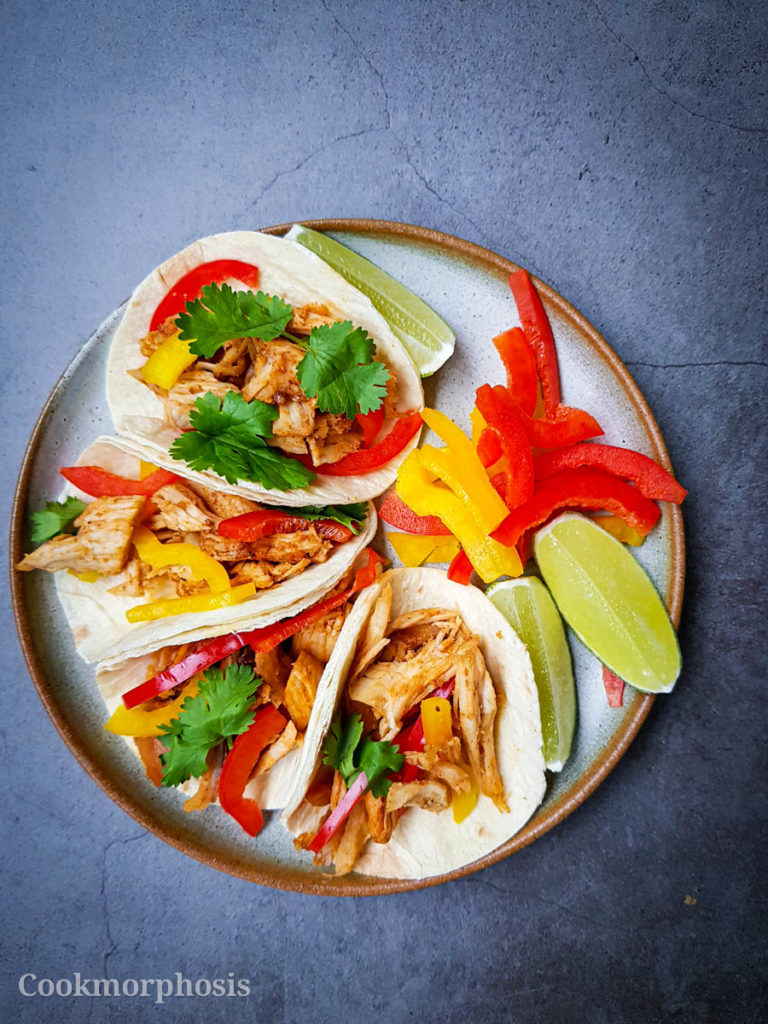 best leftover food recipe with mini cajun chicken taco topped with bell peppers and cilantro