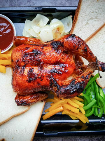perfect roasted whole chicken served with bbq sauce, white sandwich, saute bell pepper