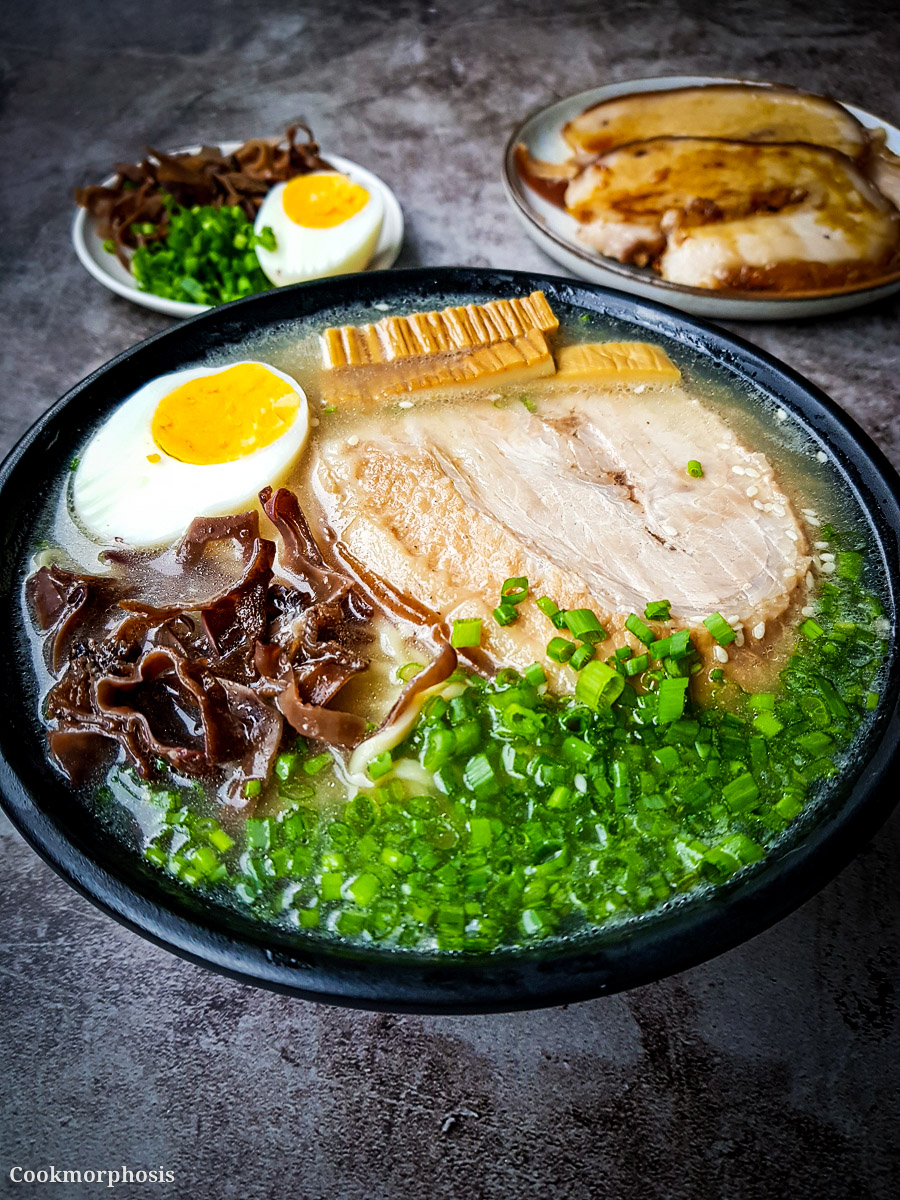 japanese tonkotsu ramen made with homemade authentic ramen broth and topped with egg, chasu, menma, and fungus