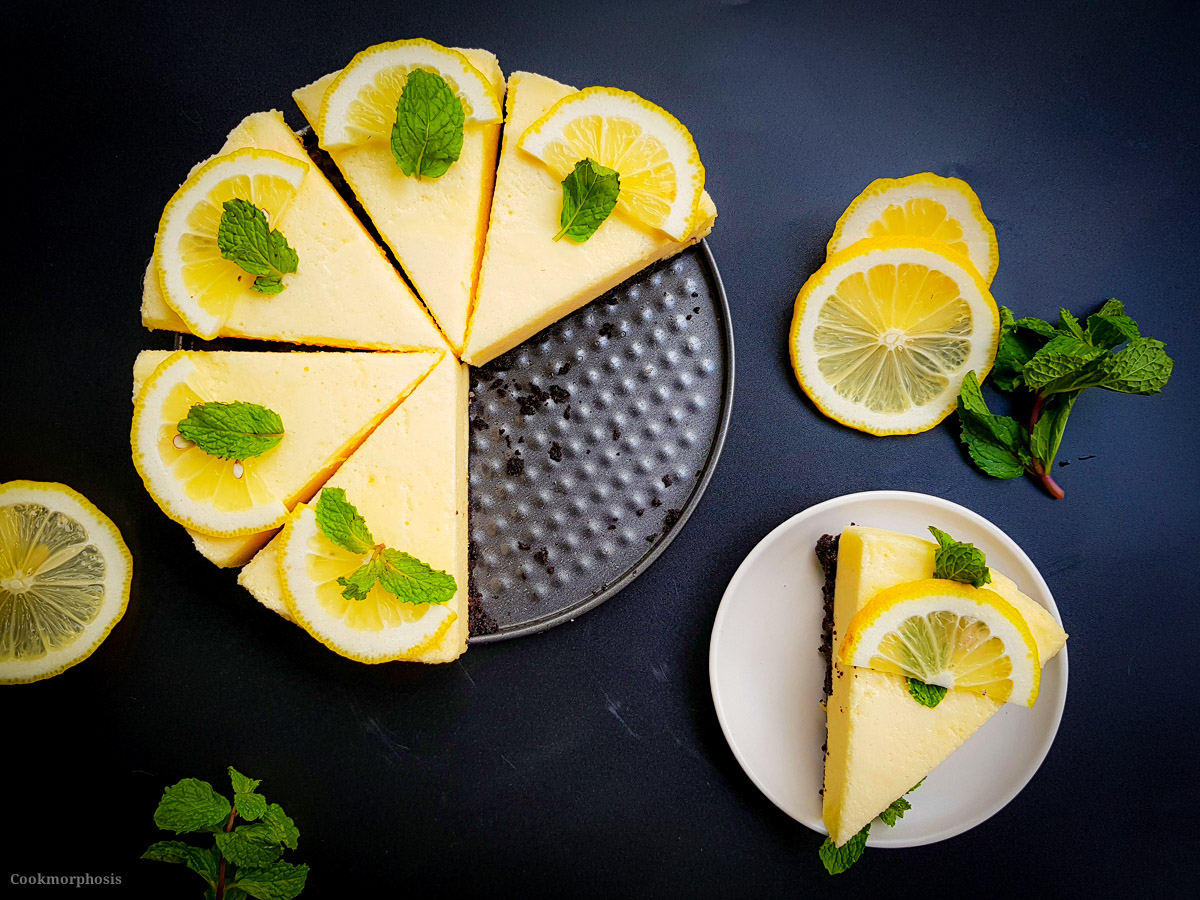 no-bake lemon chiffon cake recipe garnished with fresh lemon and mint leaves