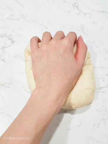 kneading monkey bread dough by hand