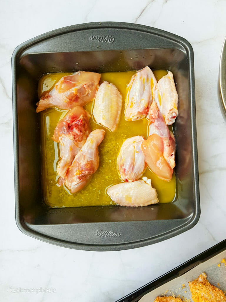 easy football snack: chicken wings drums and flaps are coated in unsalted butter