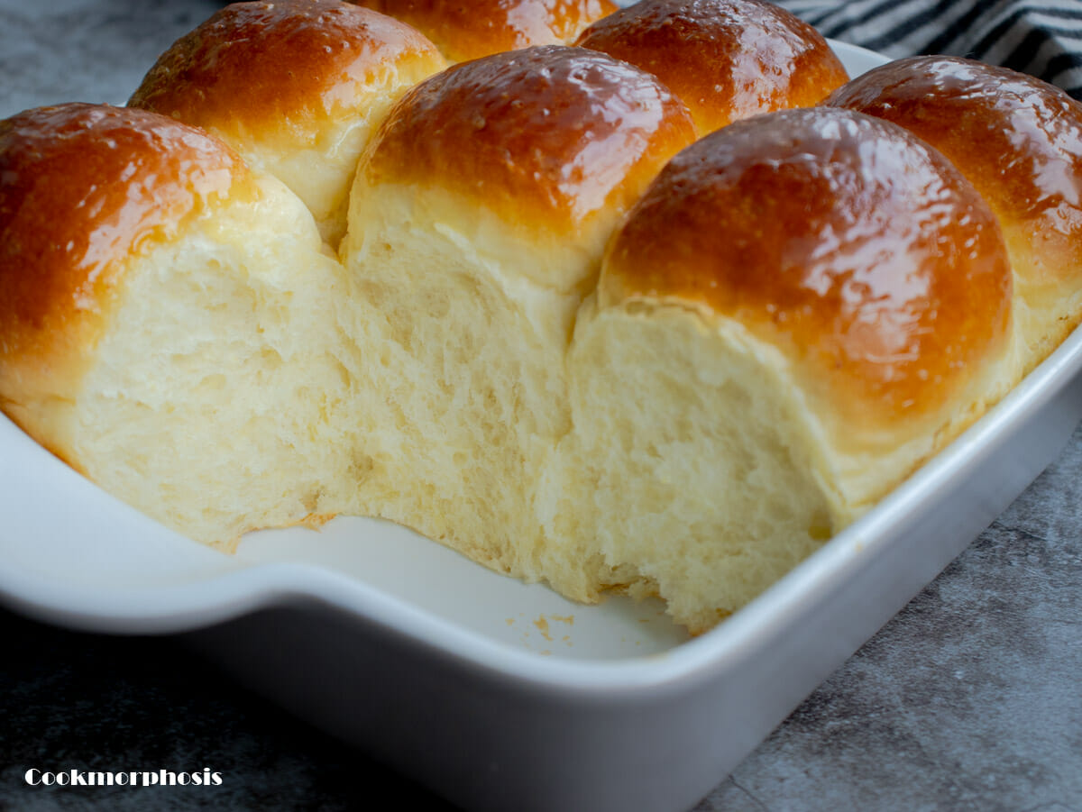fluffy milk bread rolls put in white baking dish