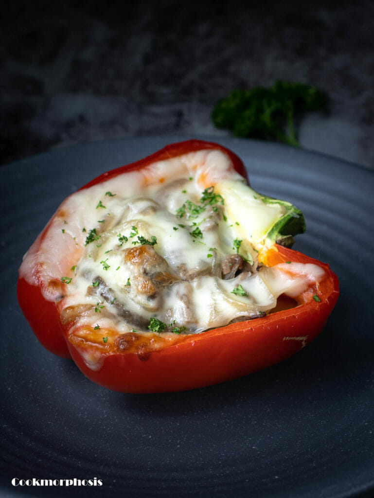half of stuffed pepper. quick easy dinner recipe, put on a grey dinner plate