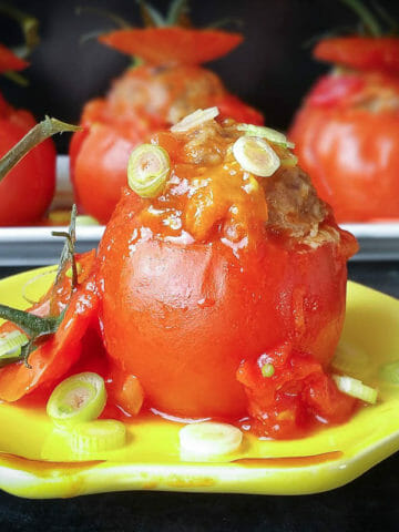 1 vietnamese stuffed tomatoes - cà chua nhồi thịt put on a yellow plate