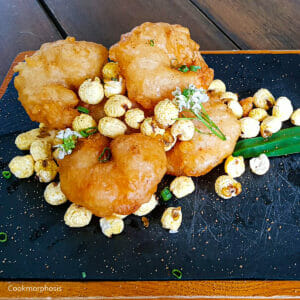 4 easy crispy popcorn shrimp served with popcorn and put on a serving board