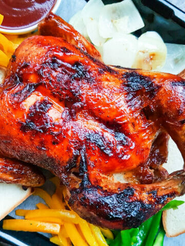 one oven roasted whole chicken glazed with sweet and spicy bbq sauce