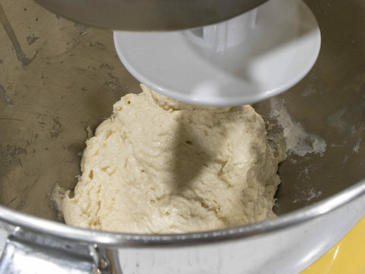 mixing until a cohesive dough form and no flour left on the mixing bowl sides.