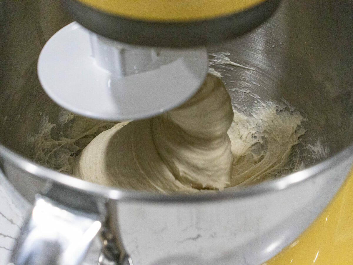 the dough becomes smooth and pulls away from sides of the mixing bowl