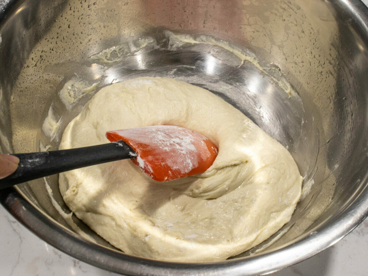 turn the bowl 45 degree and fold edge of the dough toward the middle