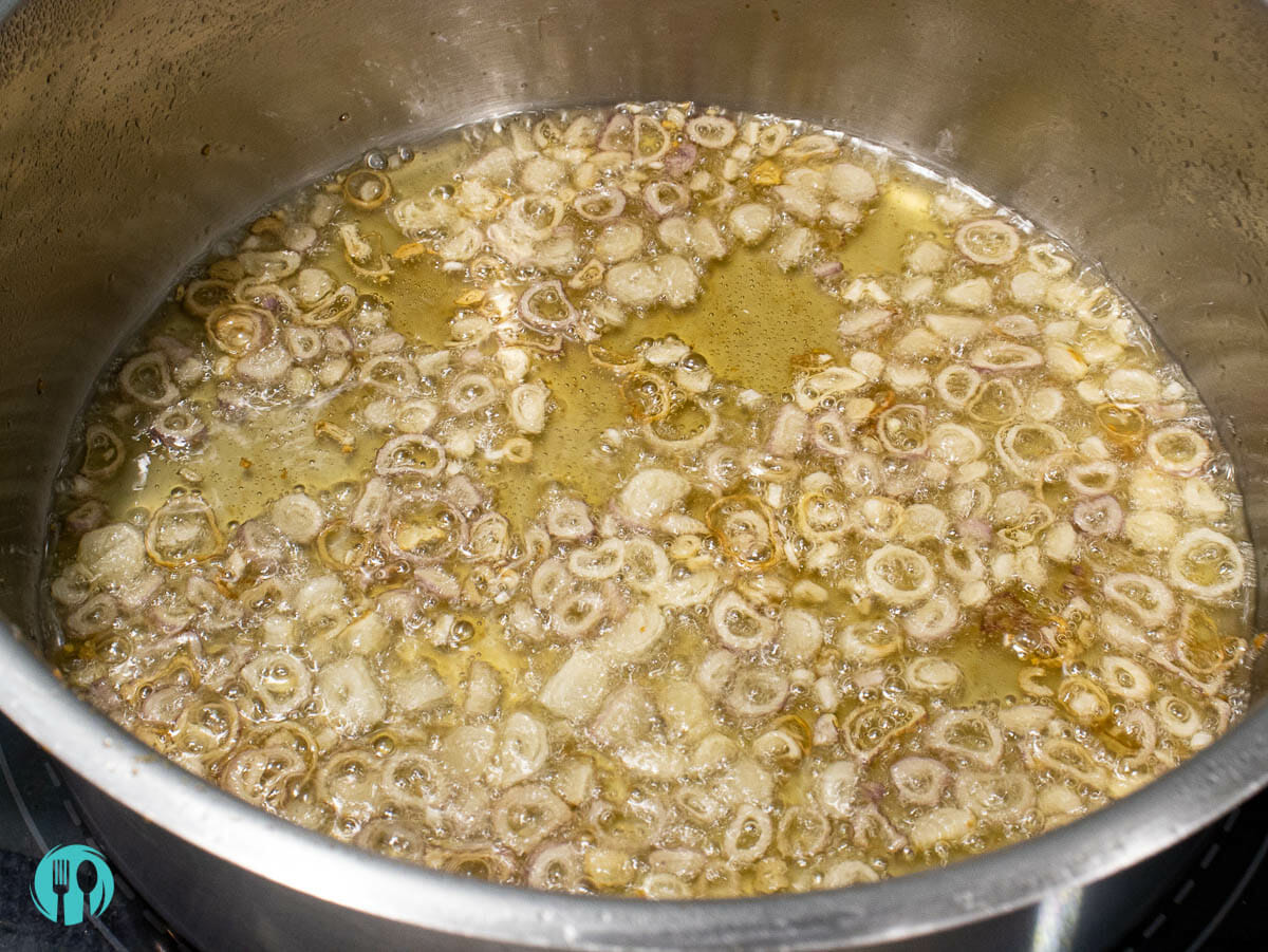 fry shallot in a pot with oil