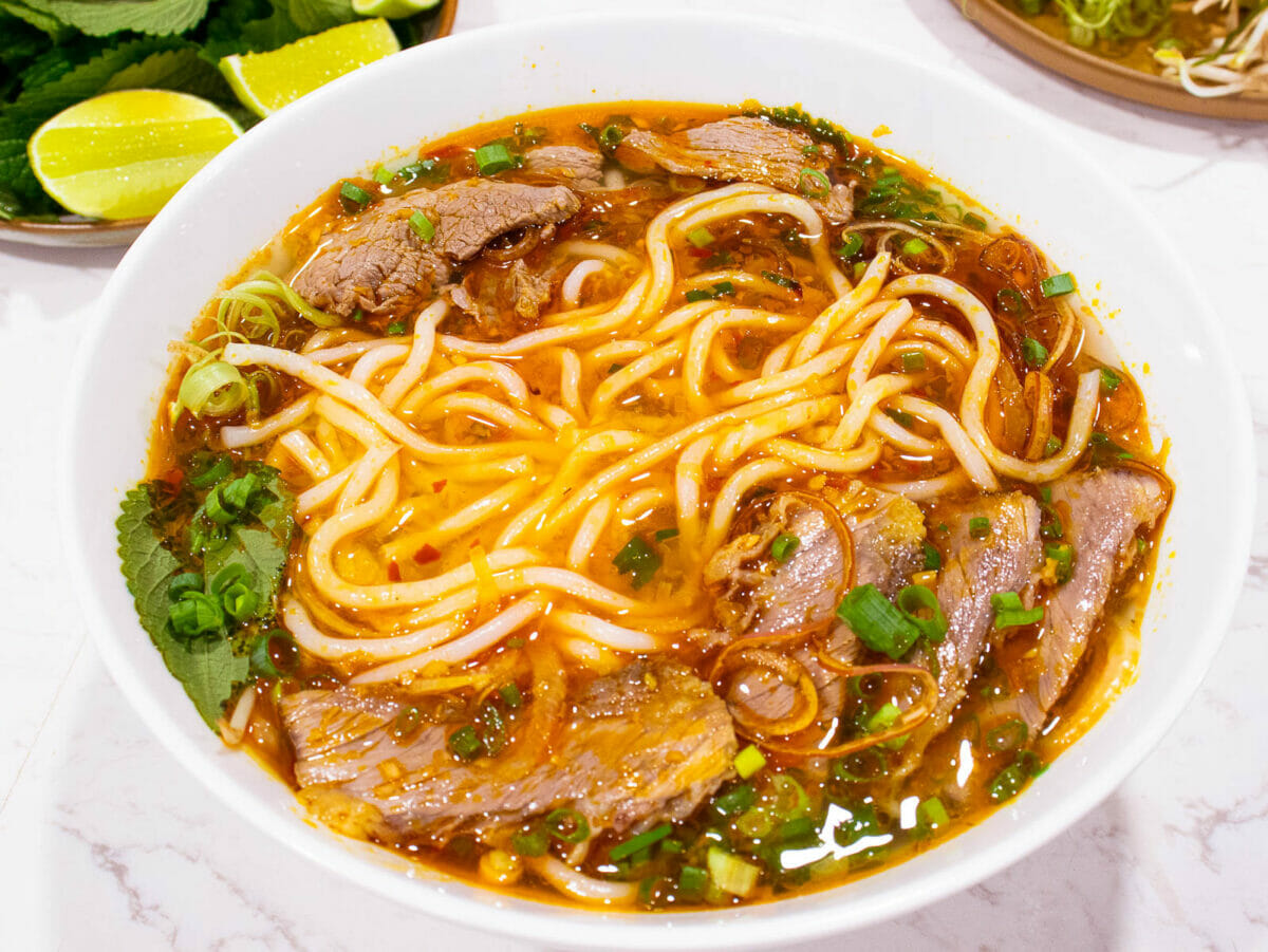 a big bowl of spicy vietnamese bun bo hue