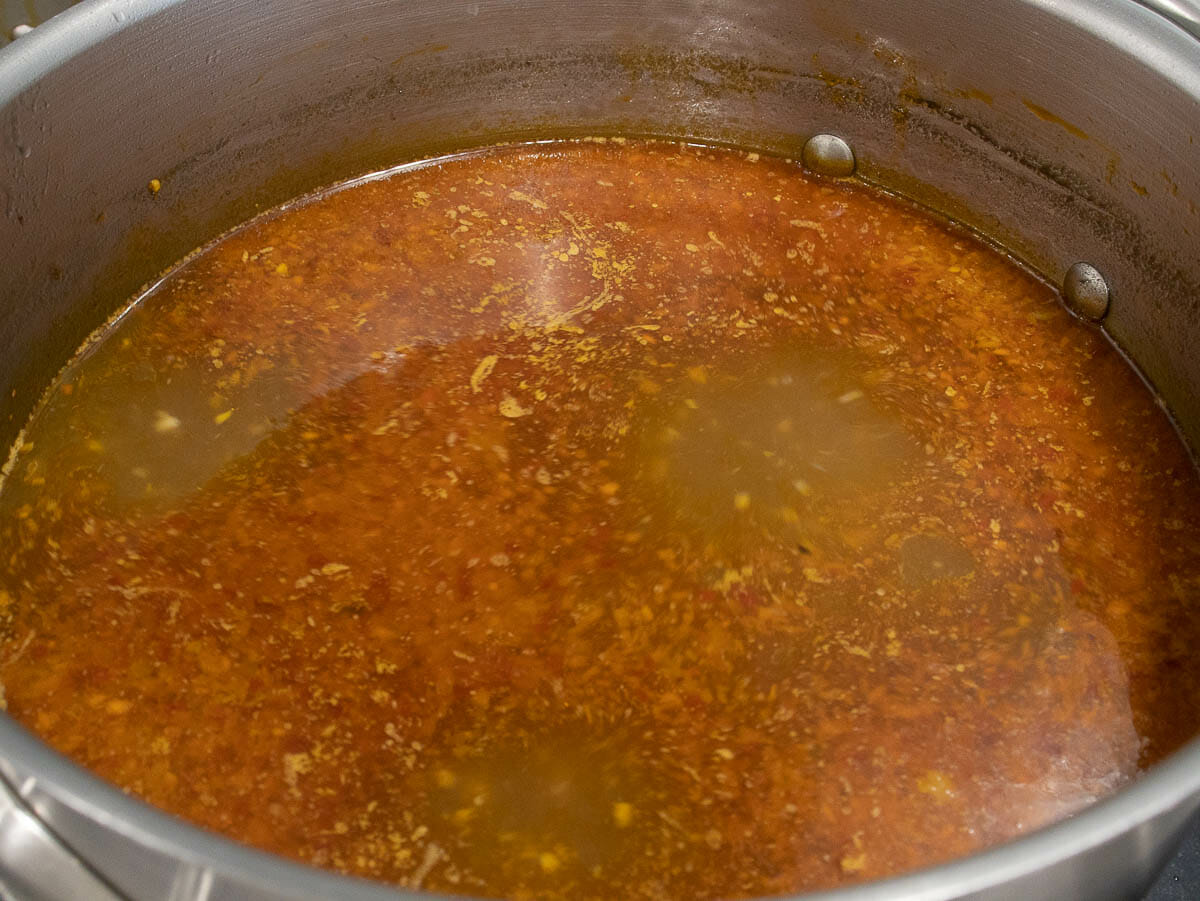 a finishing pot of bun bo hue broth
