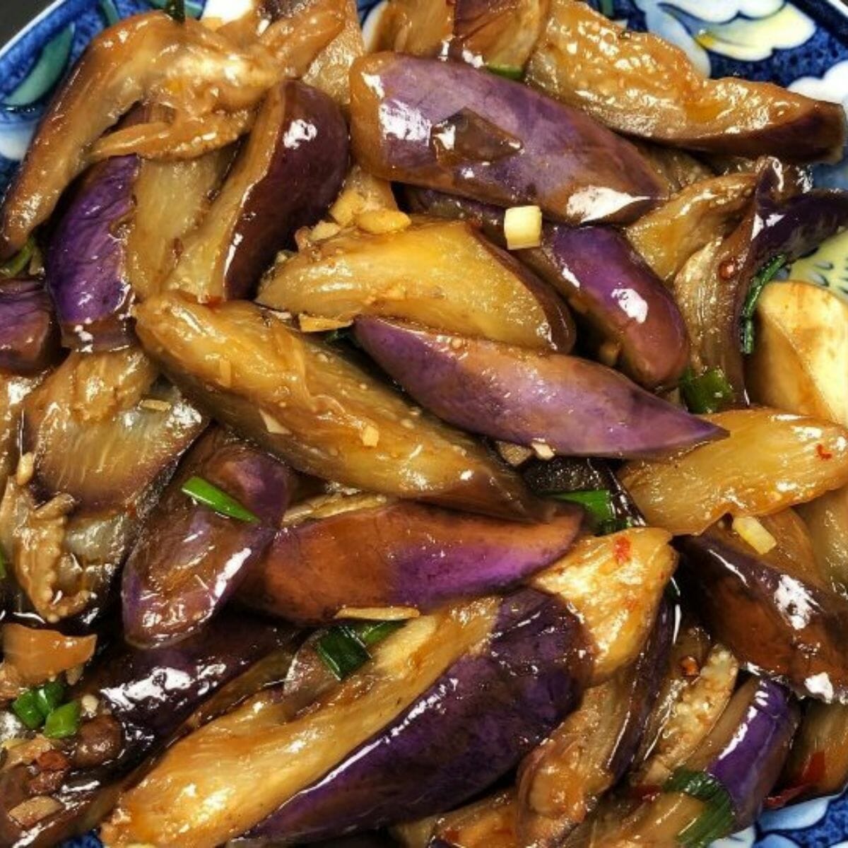 a plate of stir-fried Chinese eggplant